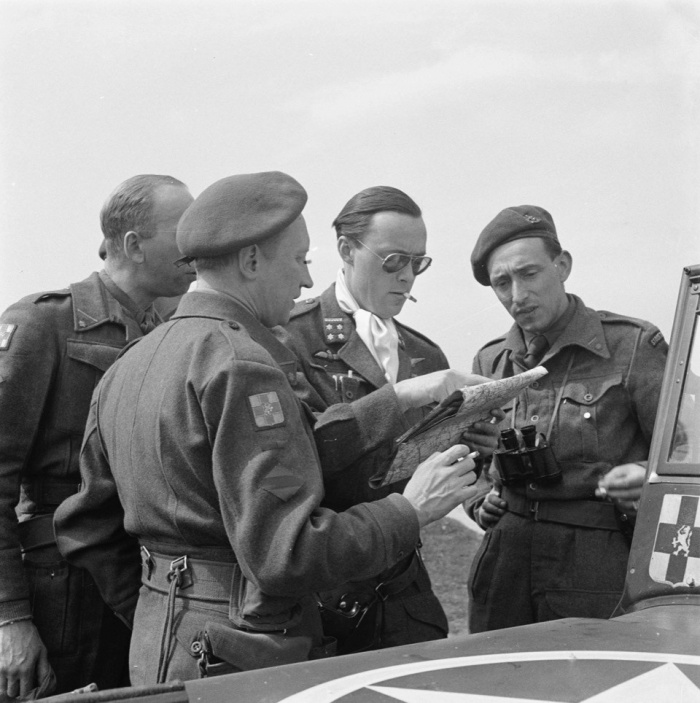 Prince Bernhard deliberating which way to take, April 1945.